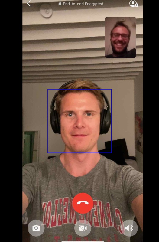 A selfie with a box printed around the face.